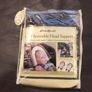 Eddie Bauer 2 in 1 reversible head support.
